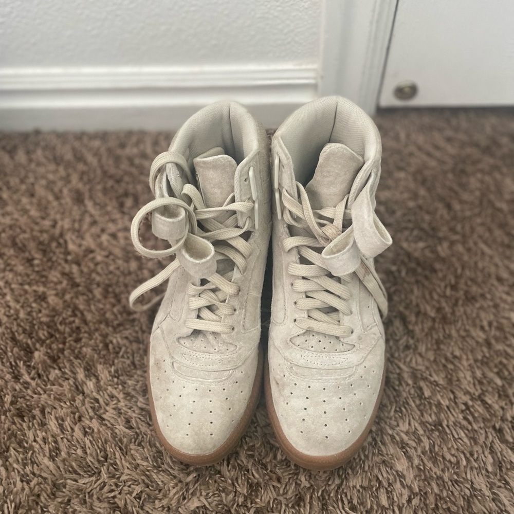 Worn twice I bought 2 small super cute Puma high tops. Excellent condition
